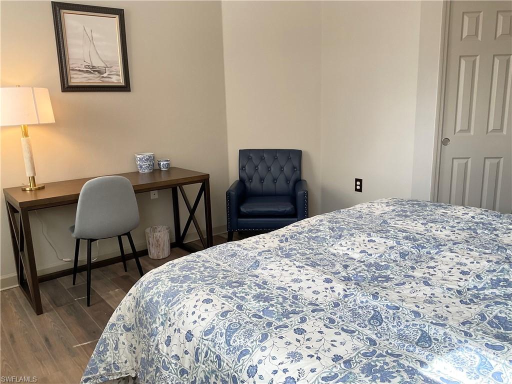Guest Bedroom featuring king sized bed and desk