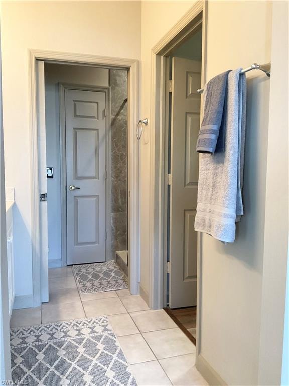 Primary bathroom walk-in shower and dual sinks