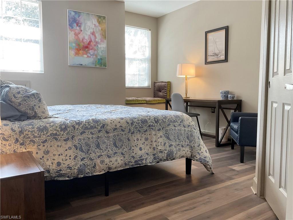 Guest Bedroom with king sized bed and window seat