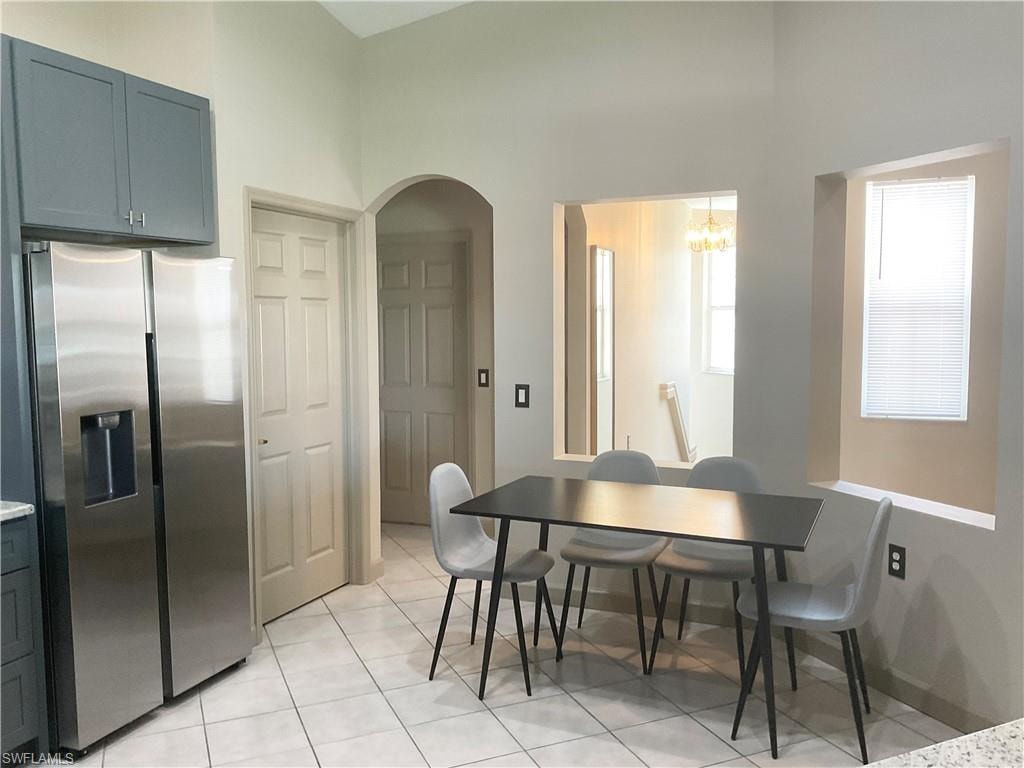 Kitchen has dining table in addition to dining table in great room area