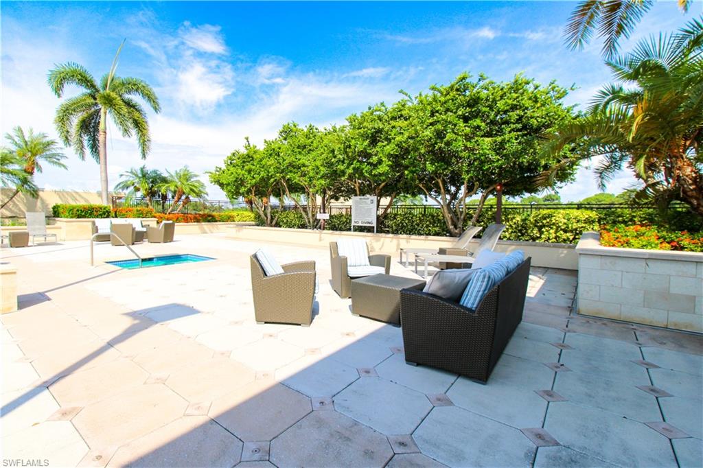 View of patio with an outdoor hangout area