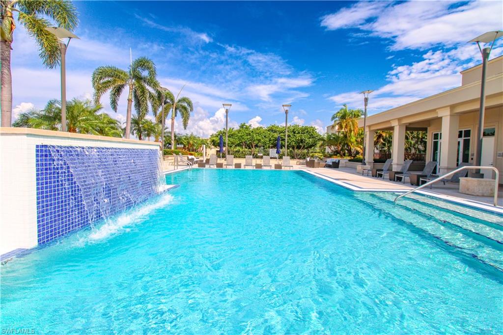 View of pool featuring a patio area and pool water feature
