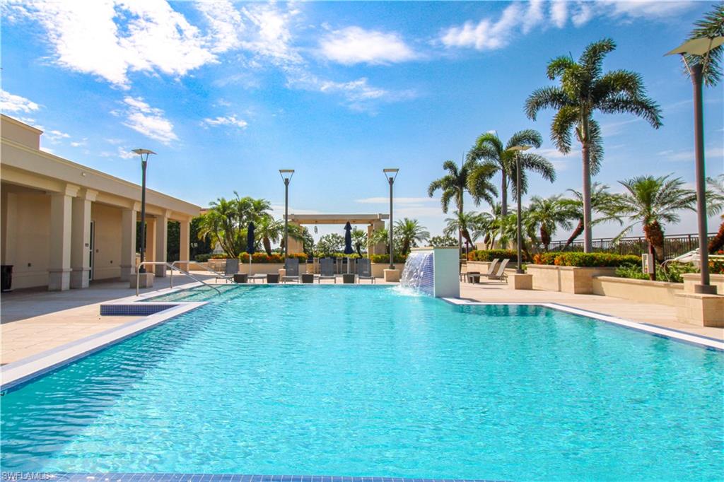 View of pool featuring a patio area and pool water feature