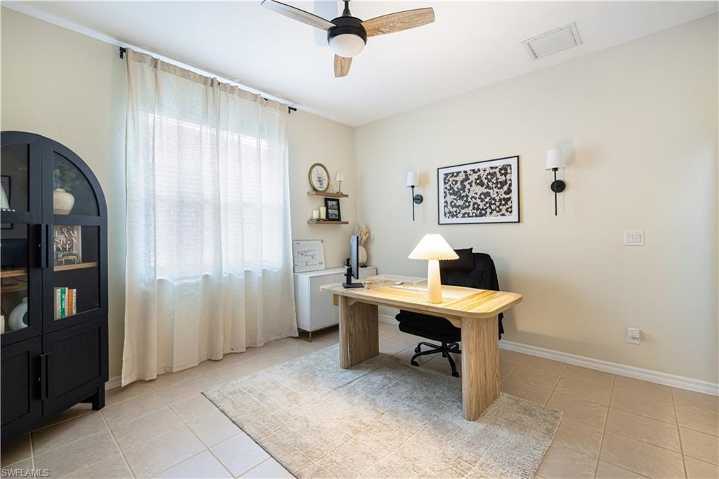 Spacious office or flex space behind doors