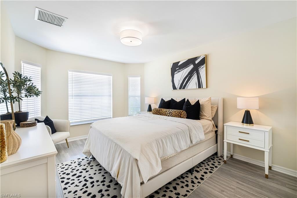 Spacious guest room with private pocket door and bathroom.