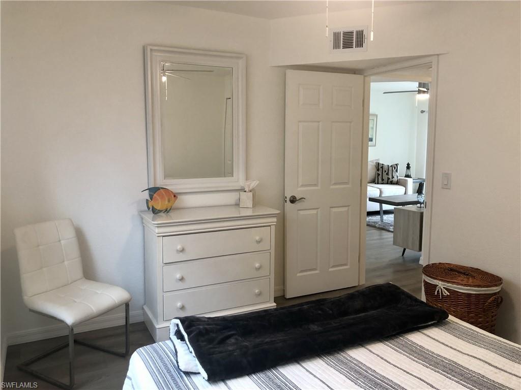 Interior room with light gray wood-finish flooring