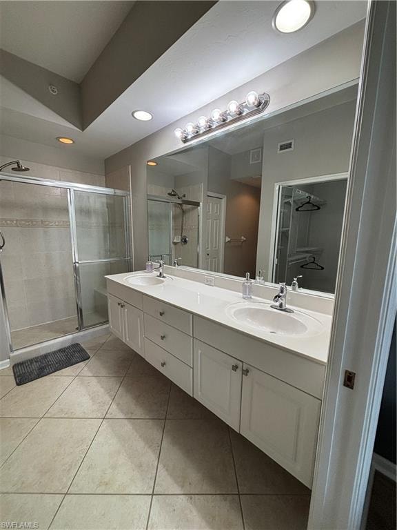 Dual vanity with undermount sinks, a spacious countertop, and ample storage cabinetry