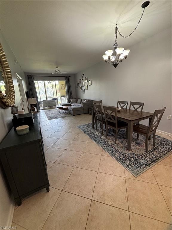 Open-concept living and dining area featuring neutral-toned tile flooring throughout