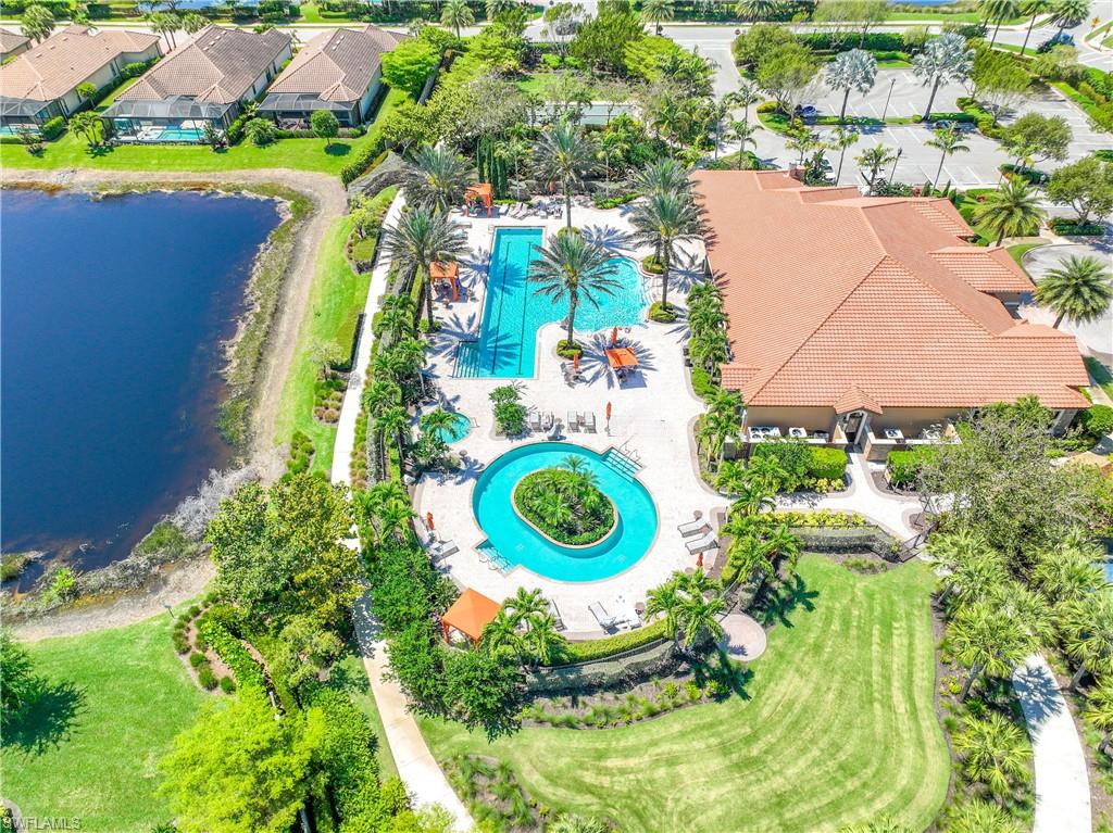 Bird's eye view of a pool area and a large body of water