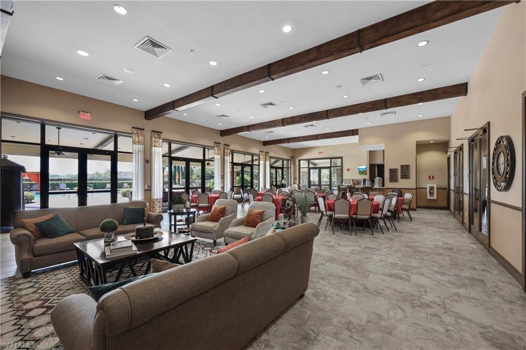 Lobby with beam ceiling and recessed lighting