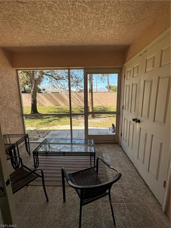 Sunroom with a rural view
