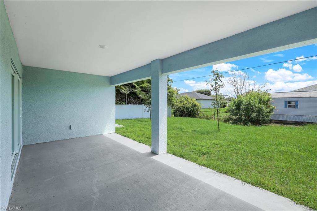 large lanai with lawn area views