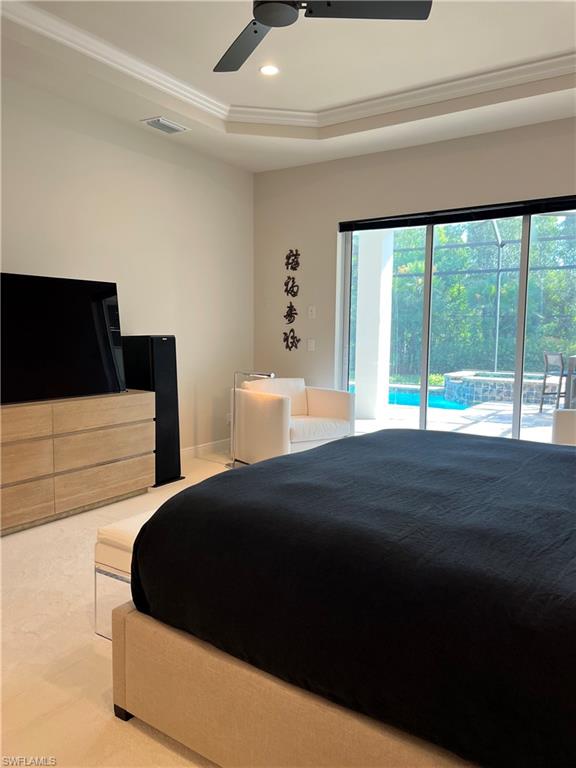 Tray ceiling with recessed lighting and a ceiling fan