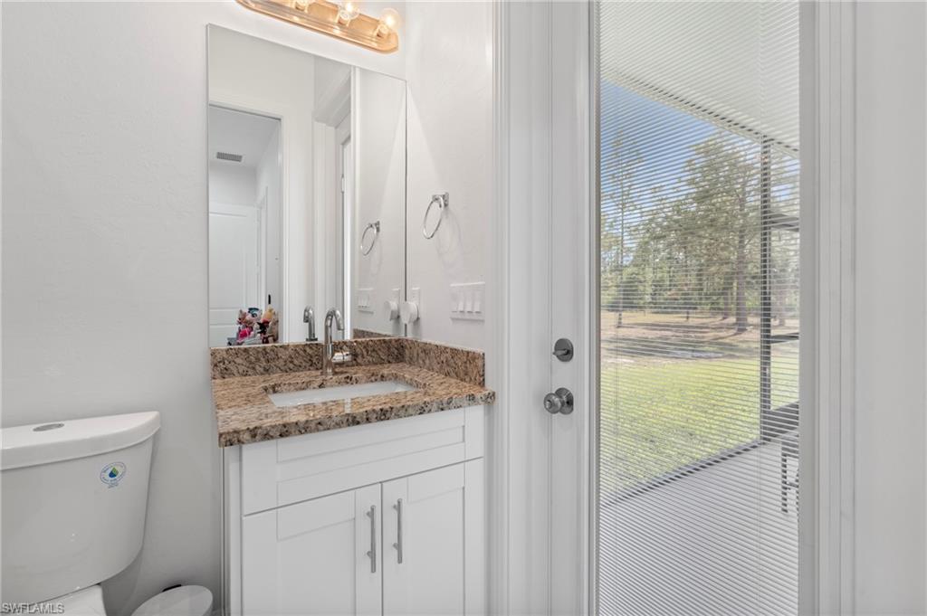Guess bathroom opens to the screened patio too, perfect to be used as cabana bathroom!
