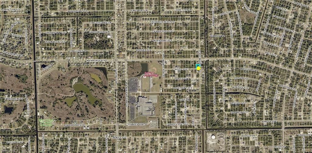 Aerial Map. Illustrating the property's location within a residential and commercial area