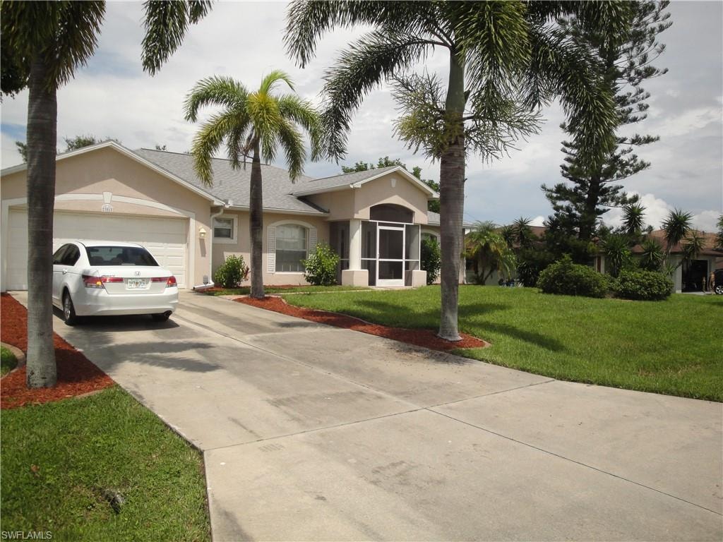 Long driveway for additional vehicles.