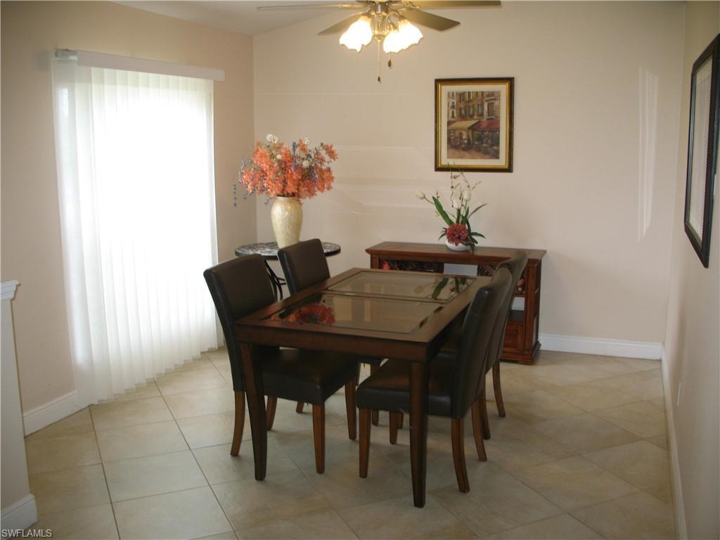 Formal dining room just inside of the entry door and separate from the great.