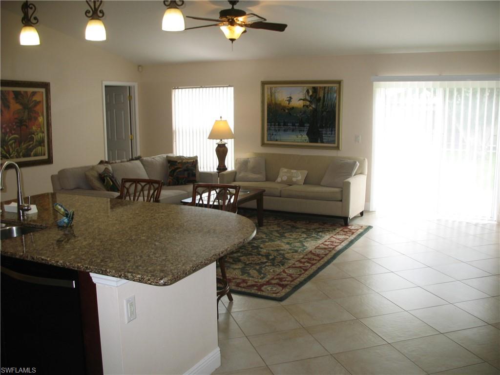 Entering the great room from the formal dining room area.