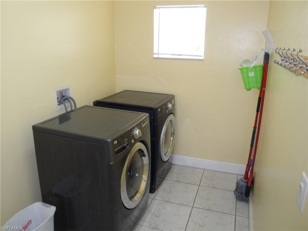 Luxury front load laundry and in a silent room of its own just behind the kitchen