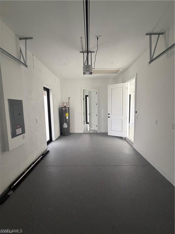 Spacious garage featuring a durable epoxy floor finish, white painted walls, and an automatic garage door opener system