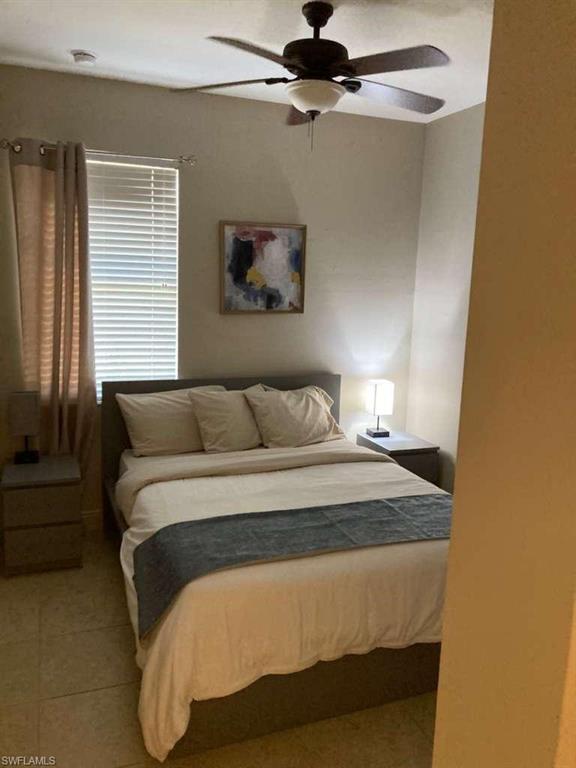 Room featuring tile flooring and neutral wall tones