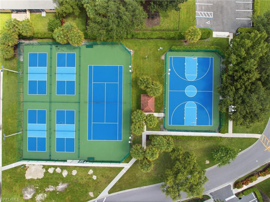 Aerial perspective showcasing three tennis courts, four pickleball courts, and one full-size basketball court