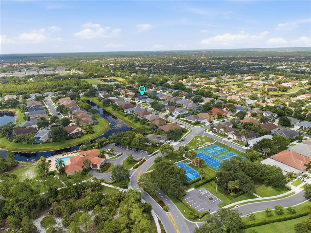 Aerial perspective showcasing a residential community with abundant green spaces