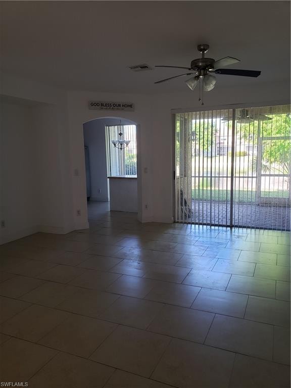 looking from front door to living area with sliders to screened lanai