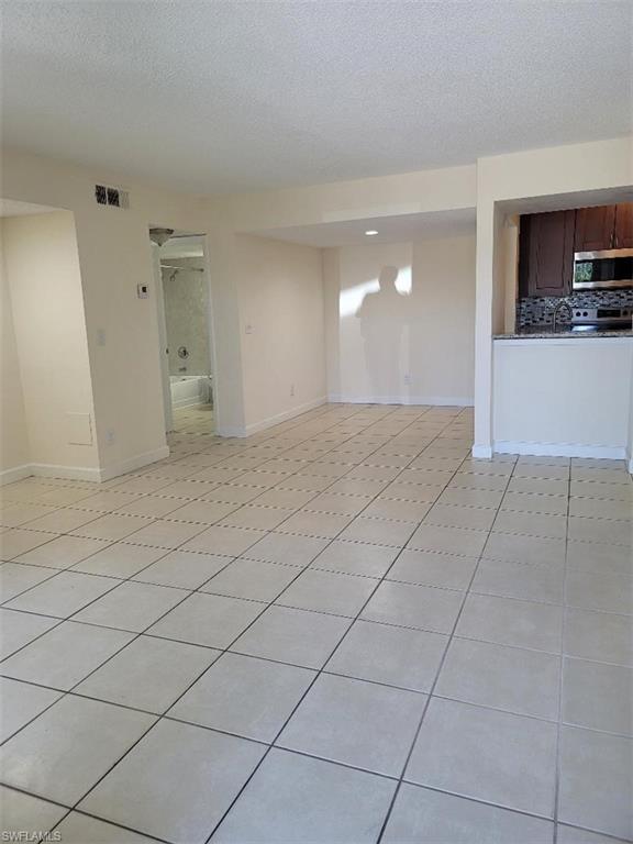 view of large living area from front door