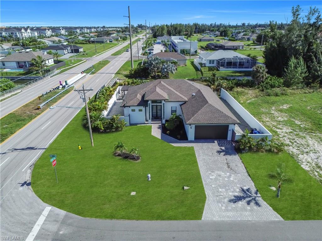 Paved driveway leading to a two-car garage