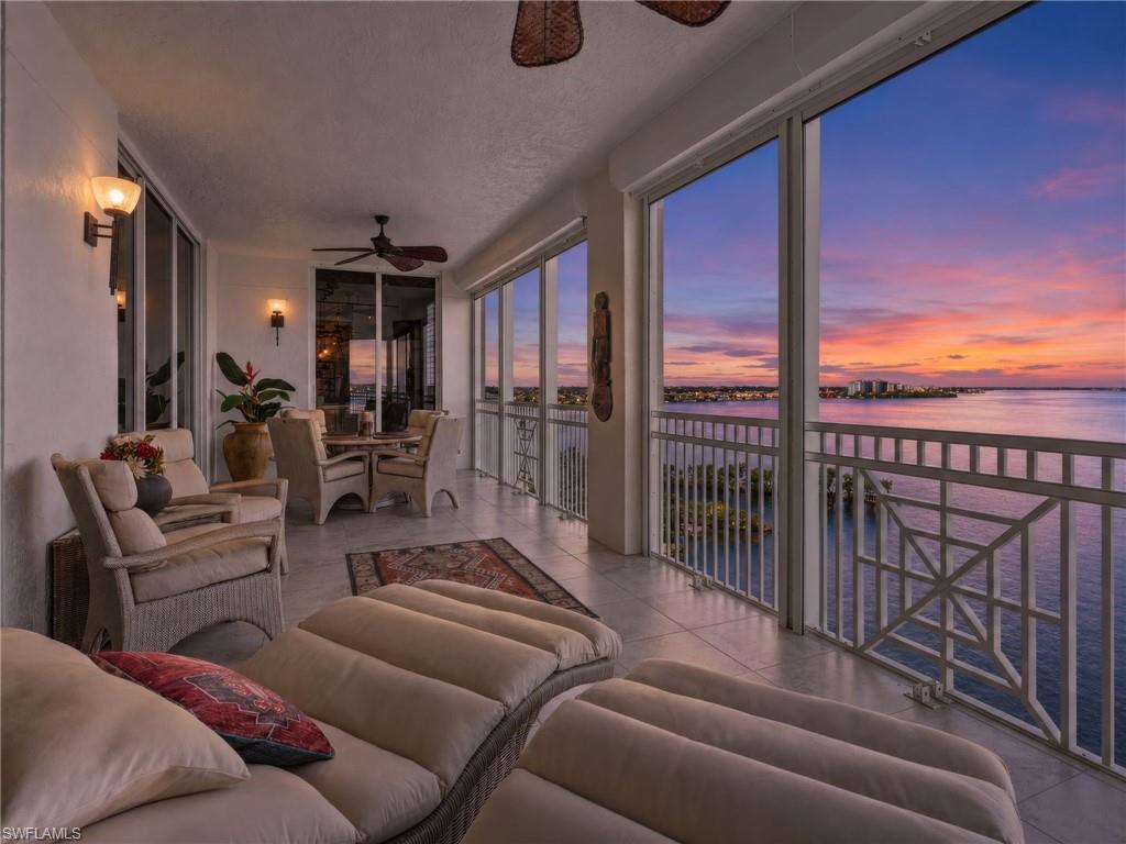 The expansive lanai offers the perfect setting for effortless outdoor living, complete with hurricane shutters for added peace of mind, while showcasing breathtaking Florida sunsets that create a spectacular backdrop each evening.