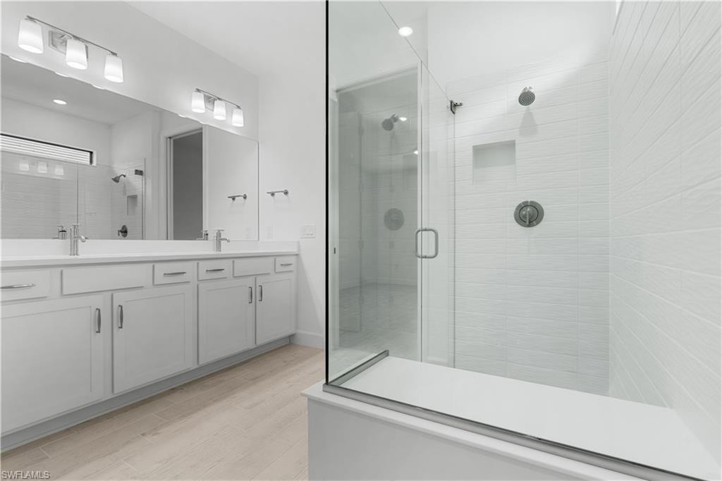 grand primary bathroom with upscale finishes