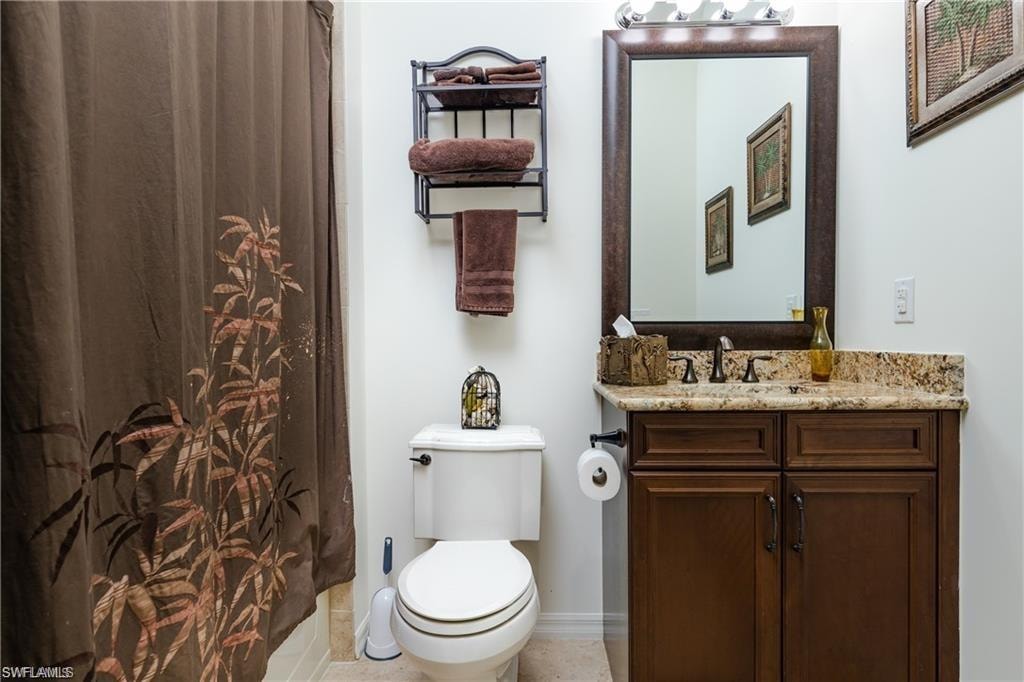 Bathroom with vanity and a shower with curtain