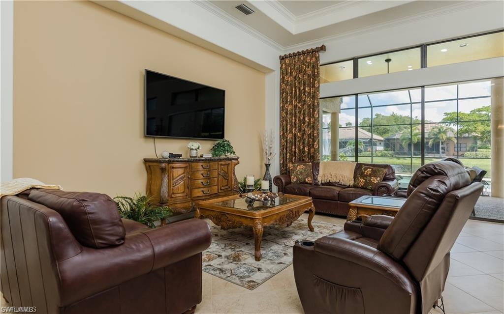Tiled living room with ornamental molding