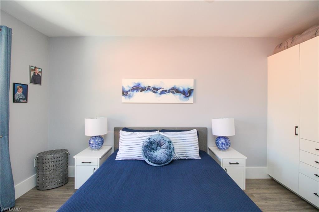 Bedroom featuring hardwood / wood-style floors