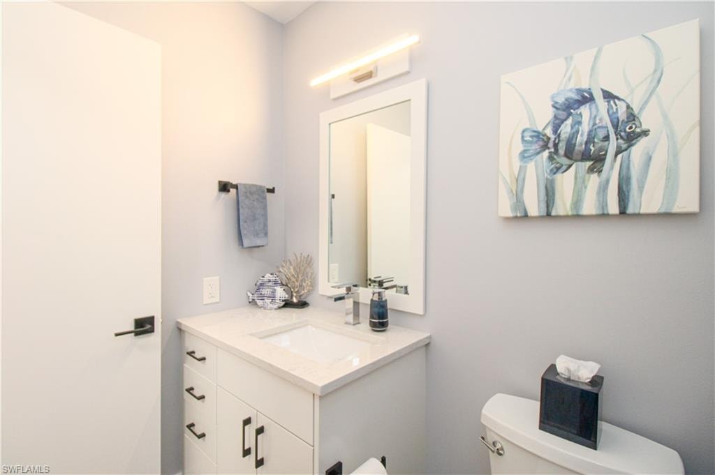 Bathroom with vanity and toilet