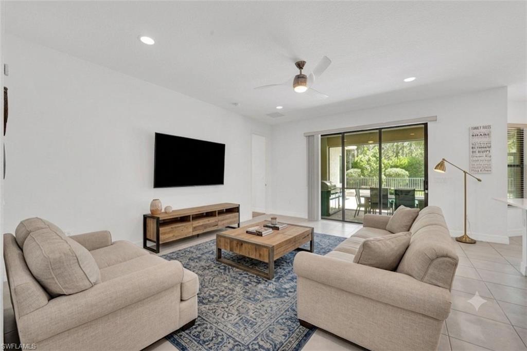 Virtually staged with new furniture and rug