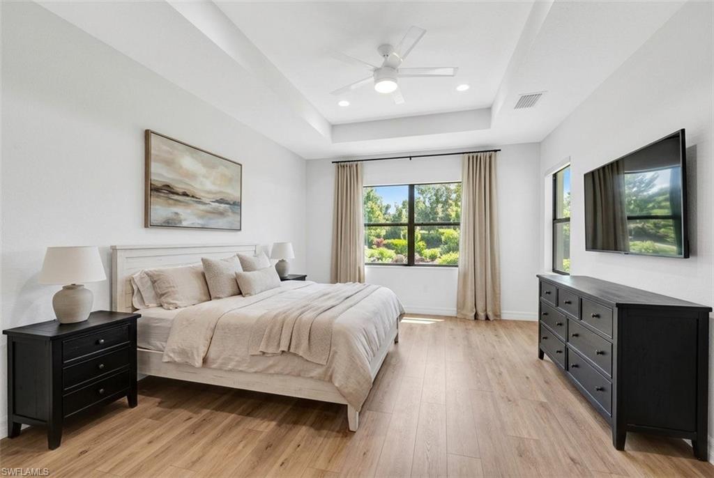 Downstairs Virtually staged to show new furniture, LVP floors, artwork and draperies
