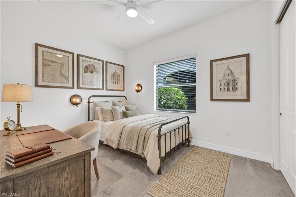 Bedroom 2 virtually staged with new furniture and artwork