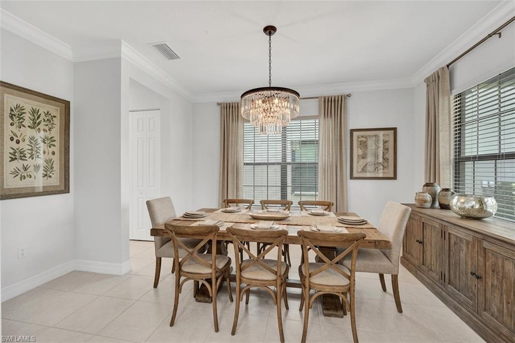 Virtually staged with new furniture, draperies and light fixture