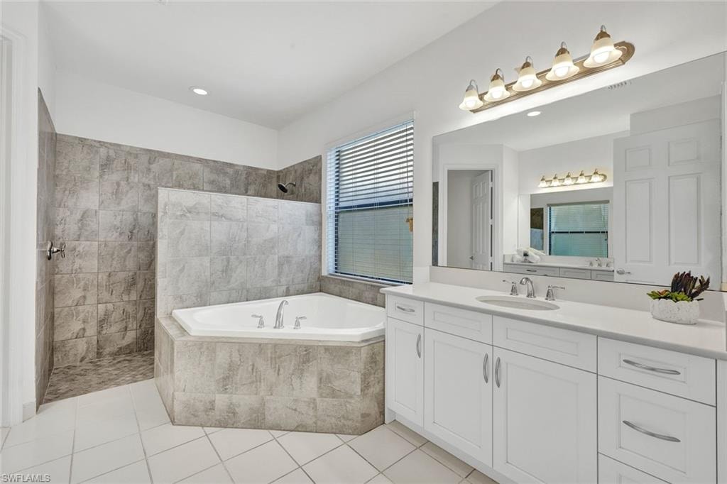 There are 2 vanities (2nd one can be seen in the mirror)