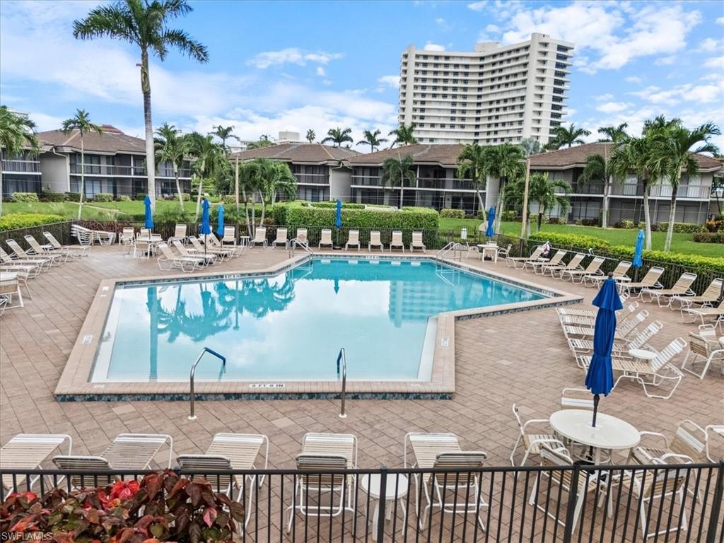 Community pool featuring a patio area