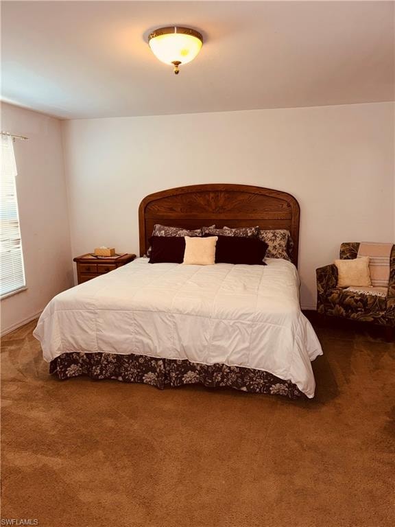 Bedroom featuring carpet flooring