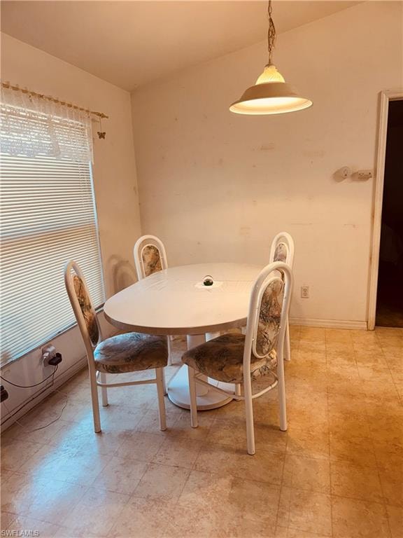 Dining area featuring baseboards