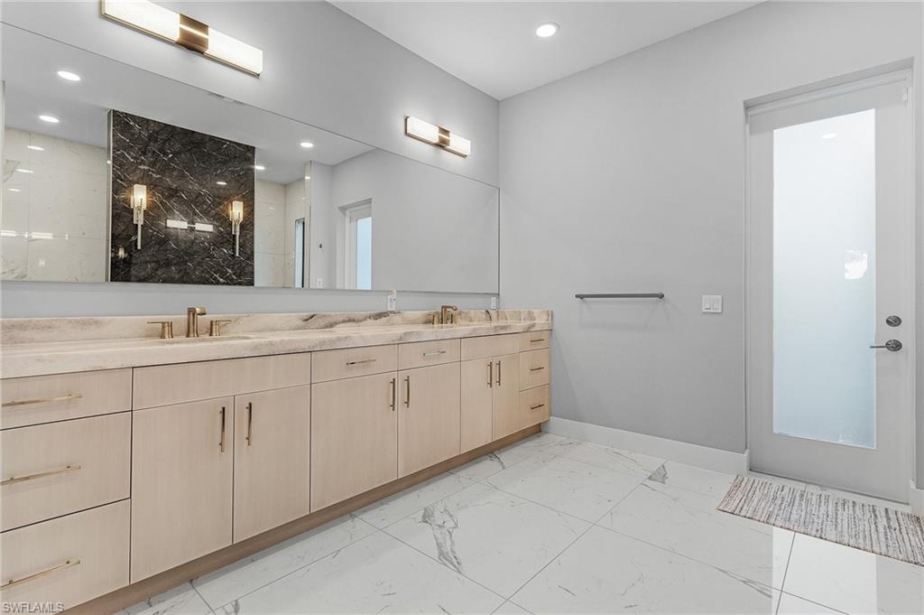 Bathroom featuring vanity and walk in shower