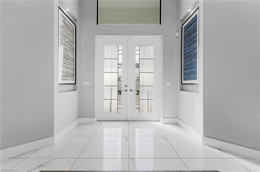 Entryway featuring french doors