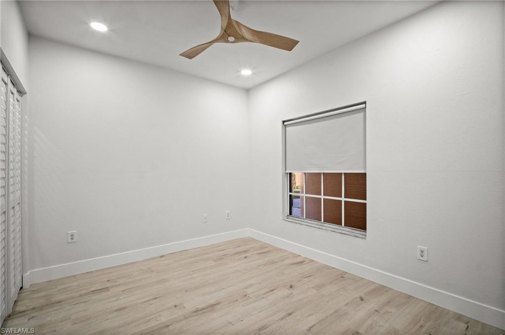 Unfurnished room featuring light wood-style flooring, recessed lighting, and ceiling fan