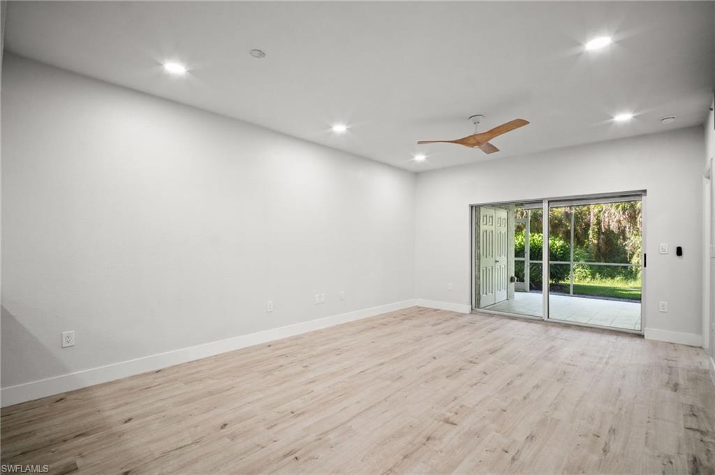 Unfurnished room with light wood-style flooring, recessed lighting, and a ceiling fan