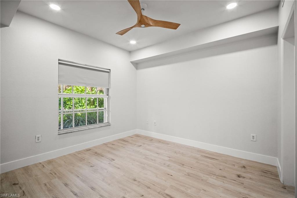 Spare room featuring light wood finished floors, recessed lighting, and ceiling fan