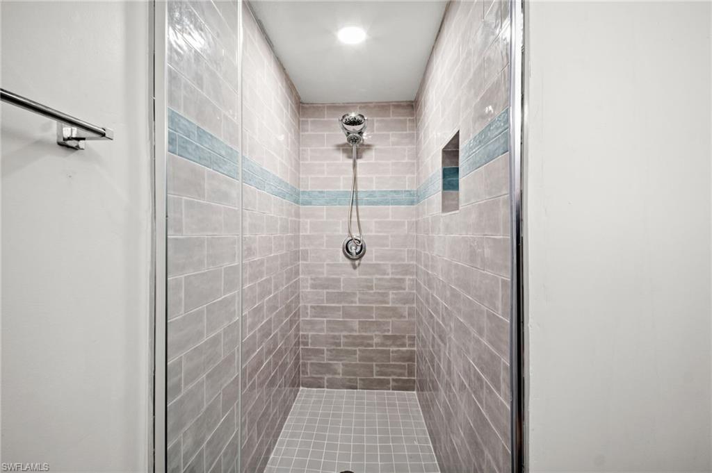 Bathroom featuring a shower stall